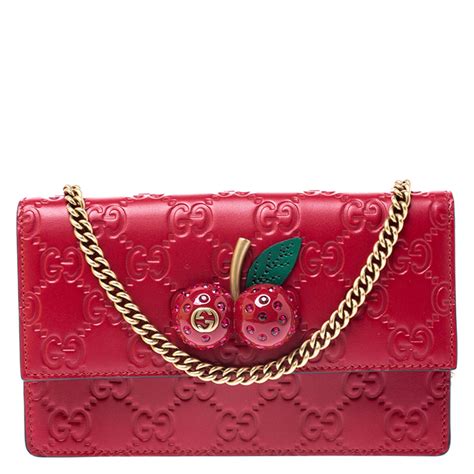 gucci cherry bag red|Gucci pink mini flower pouch.